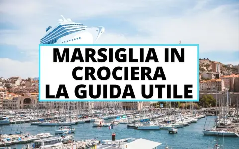 Porto di Marsiglia pieno di barche, con la scritta "Marsiglia in crociera: la guida utile". Scopri cosa vedere a Marsiglia in crociera!